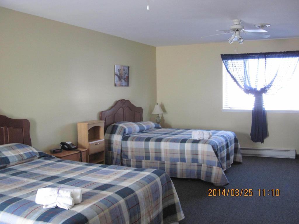 Motel Parc Beaumont Inc. Habitación foto